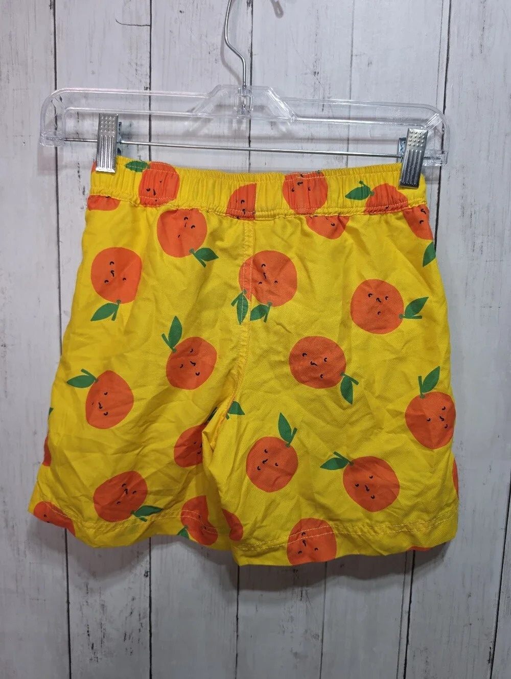 Hanna Andersson Boys Yellow Oranges Print Sunblock Swim Trunks Shorts Size 6-7.